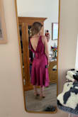 Took others' advice and sized down to an XXS (normally XS). I ordered 2 dresses for an event and ended up returning this one because I liked the other one more. It wasn't the most flattering for my chest, but I think if I had gotten my normal size, it would've looked worse. Love the color! - Rebecca R.