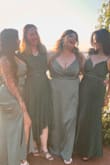 The dress, which is a vibrant emerald green silk extremely stunning. I received numerous compliments on it, and it was very comfortable to wear all day. - Jemimah T.