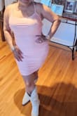 This dress is beautiful, very stretchy, and material is thick - Isela V.