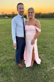 This dress was so pretty and perfect for my sister's wedding. I got an XL bc I know this stuff runs slightly small, and I have large boobs. I'd say it fits more like a L. My other sister, who is normally a M, got a L, and it fit her perfectly. My daughters were also in the wedding but wore different dresses (in picture), and they also had to size up. Overall, I loved this dress! So classy! - Brooke G.