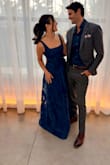 Loved this dress and got so many compliments! I'm 5'5 and wore it with 3 inch sling back pumps, it was slightly hitting the floor. This is a size small. - Marissa C.
