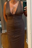 The first large I ordered had a wonky zipper that continually stuck at the waist/bust seam. Lulu's customer service is exceptional and sent a replacement large out right away.  I tried a large and extra large before going with the large. While the large was snugger in the waist than the extra large, the extra large was baggy at the neckline between my shoulders. Kept the large and the only alterations is hemming. Since I'm 5'2", quite a few inches are coming off, and the slit in the back will be lengthened after the hem, so it hits me around the back of my knees. The dress is currently with the seamstress, but I've attached a couple of pics of my home try-on. This dress is gorgeous!! - Ann K.