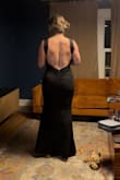 I ordered this for an upcoming wedding and I am so excited to wear it. I am curvy athletic and look stumpy in many dresses. This one elongated by body and as just the right mix of elegant and sexy. - Leslie S.