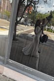 I wore this dress for court wedding and it was perfect. The fabric was very well quality and looked expressive. The back was super cute as the. True to size, I'm usually a medium and got a medium fit like a glove! - Liana G.