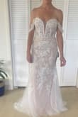 I bought this as an option for my wedding dress. It's absolutely gorgeous, and I was impressed with the quality. I put on some 3" heels, and it was still pretty long, so I planned to get it hemmed. I decided to return it because I realized it wasn't really "me". However, if this is your style, I highly recommend it! - Brooke F.