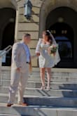 Got this for my courthouse wedding. I cut the little arm ties on the sleeves off, so comfortable and cute. - Gabrielle T.