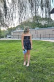 Cute dress. Very hard to keep the top up even with body tape. Otherwise cute. - Holly P.