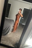 This dress is beautiful, but runs big. I originally ordered a medium and returned for a small. The small snatches me in and is stretchy. For reference, I am 5'2, 135lbs, and a 36D. - Carolyn C.