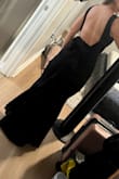 I thought I would love this dress more, but it seemed like a lot of material, and because of the black color it was hard to tell that the material on the back was a bow.  I returned this dress - Sidnee R.