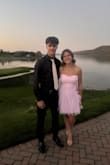 My daughter wore this pink dress to her homecoming, and it was absolutely perfect! The color was stunning, the fit was beautiful, and she received tons of compliments all night. The fabric looked elegant but was comfortable enough for dancing. It photographed beautifully too; truly the perfect dress for a special occasion. Highly recommend! - Maria F.