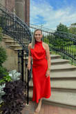 I LOVE this dress! The cut, color, fit, and length. I wore a strapless bra given the asymmetric cut of the neck/arms and I wore a Spanx like undergarment to smooth out my little gut and behind (personal preference, not a necessity). I had it dry cleaned to get the wrinkles out. Wore it all day/night and was comfortable and not restrained in anyway. The only challenge I had was fastening the two small buttons at the back to close the neckline - I eventually got it. All my accessories - down to my toes were gold. - Christine S.