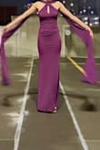 Great dress! Way stretchier than I expected. The ruched detailing was great, fit like a glove! If I had more time, I might've hemmed the scarf details. It was raining when I wore it, and they got pretty wet and were hard to keep off the ground. - Madison B.