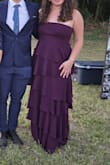The dress was perfect! It fit perfectly with no alterations. So tall girl friendly! I'm 5'10" and wore about 2.5" heels. The tiers moved beautifully while dancing. It was easy to steam too to get out the package wrinkles! - Samantha B.
