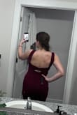 The dress is a little bit snug, but I wouldn't size up. The material is nice and thick and really snatches everything in! - Victoria S.
