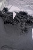 I loved this dress, but about an hour in of wearing it, the feather-lined part separated from the dress. It also happened in the back. And aside from that, the feathers are pokey in some areas. - Crystal V.