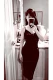 The dress fits perfectly and looks as shown in the picture. It's very well made and comfortable to wear. - Thananya B.