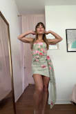 I have a petite but fit body with broad, muscular shoulders and narrow hips with good glutes. It's hard to find a flattering dress for my body type online. And guys, this dress fits like a glove! I was also very pleased with the quality and uniqueness of the dress. I got so many compliments! I wore it for an outdoor October Miami wedding where the weather was between 80/85 degrees - Beatriz V.