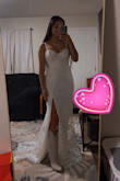 In love with my dress, we will be taking photos in June for our wedding, and this dress is perfect, it fits amazingly, and came really fast, and the packaging was neat. - Maria G.