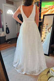 I bought this dress for my last minute elopement, and it is so cute. Great fabric, well made and really pretty. The shipping was really fast, too. I'm 5'4, 115lb, and flat chested- the extra small was way too small- not the dress's fault, but a size up would have fit me much better. I ended up returning it, but if it had fit- it was a contender. - Daphne B.
