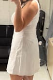 I love this dress! I was really happy this dress actually fit my bust, given that most dresses don't. Love the leg split. I got a bodysuit with built-in bra to wear under it, but a normal bra would def work. Super cute!! Bit wrinkly when it came in, but I got a steamer to fix that. - Allie T.