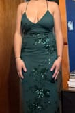 I loved this dress it. It was beautiful, form fitting, unique, and sexy. It was long for me, so I would have needed it hemmed. Ended up going with something shorter in the interest of time. BUT if it works for your occasion, don't stop, run for this dress! - Katherine S.