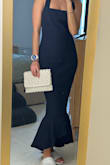 I love it. It's well made, doesn't look cheap at all. It comes with a strap. Will use for a wedding at the beach - Flavia C.