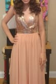 I bought this for a last minute prom and I LOVED IT! I got so many compliments and it came right in time and fit perfectly. The color was perfect and the sparkles were classy. It's the 4th dress I bought here and I've loved them all. - Megan M.