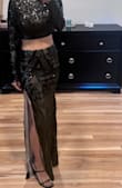 I ordered this on super short notice for my 40th bday, along with some other outfit options. As soon as I put this on, I knew it was the one.  It fit perfectly and was super comfy. I danced around all night.  Tons of compliments - a few saying it gave off JLO vibes. The skirt is long. I was wearing a 3" heel, and the skirt still hit the floor, but it didn't drag. - Gina P.