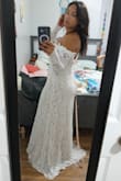 I ordered a size S but the sleeves were too tight. I wasn't able to zip the dress by myself; the zipper is hard. - Jennifer V.
