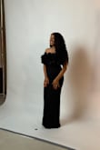 This dress was feminine, attractive, and flattering. I loved the decal across the bust and the otherwise simple silhouette. I received many compliments and felt beautiful! - Blaire R.