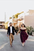 I wore this dress for my engagement pictures, and it was perfect! Super flattering, and it came out great in most of the pictures. The sleeves are a little tight around the arms, but if we were taking a picture with my arms raised, I just put the sleeves over my shoulders instead, and it looked/felt better. Definitely recommend this dress!! - Camille R.