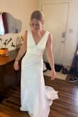 I wore this for my elopement/celebration, and it was everything I dreamed of. I got the bust closed up a little bit and added a bustle, but other than that, she fit perfectly! I did read it ran a little large, so I sized down to an XS and it was absolutely perfect. So many compliments, and I felt so beautiful. - Leah T.