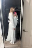 This dress was too short for me and just didn't fit well enough for my liking. I'm 5'8, 220 lbs and 25 weeks pregnant. I thought it would be long enough but it's short in the front. The fabric was okay but I don't know if I love it. - Emily M.