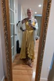 I absolutely loved this dress. The fabric had a beautiful weight to it, and I felt like a princess. It was perfect for a Fall wedding where the guests were encouraged to wear jewel tones (I went with citrine). It wasn't maybe 3 hours into the wedding at dinner when my left strap popped. Thank goodness I went with adhesive bra cups; otherwise, my cousin's guests would've gotten a bit of a show. Thankfully, I got pictures with my hubby before the boobcident, but I wasn't long for the dance floor after that. - Anna S.