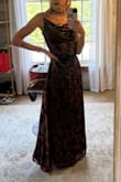 This dress was perfect for a wedding, but they only had medium left, so I didn't order. They said they'd restock in September, then that turned into October 23rd (the day I left the state), then no date provided, to having some back in stock less than a week before the wedding so I ordered & had it shipped asap! Straps held up, was a little loose in the middle, but nothing that made me feel fat or anything, and I loved how the velvet looked in different lighting :) very pretty and worth the timing anxiety - Alexis S.