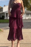 I got tons of compliments people young & old at the wedding I attended! Fits great and such a beautiful color! Pleats held up well and has a bit of stretch in the top! (measurements are educated guesses not 100% accurate) - Francesca R.