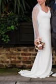 This dress was exactly what I was looking for. I didn't want to spend a fortune on my second wedding dress but still wanted to feel like a bride. I have a smaller chest so it was a little loose in the cup size and the shoulders and hem had to be adjusted but the dress was beautiful. The material was great but could have been lined a little better but it overall wasn't a big deal. Delivery was fast and I couldn't be more happy. - Tiffany R.