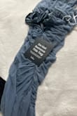 It was smaller than me. So it is not easy to wear. I don't like it - Trinh N.