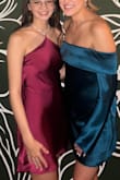 I received so many compliments on this dress. It was truly beautiful, but the arms were a bit tight. The length was perfect and the color was flattering, just be weary about the arm restriction! - Bayleigh M.
