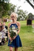 I had bought the longer version of this dress for a wedding ("mythical kind of love"). I was in LOVE with delicate and beautiful the dress was. I was going to buy the longer version and alter it shorter for a bridesmaid dress. Was SO excited when I saw this available in navy blue. It is perfect length for me, and I'm so excited to wear it!

**updated** I attached a candid image of the dress (other pictures it was hidden from the bouquet). One of my favorite purchases from LuLu's! It was extremely delicate and classy. - Jenna D.