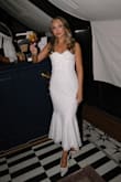 I wore this dress for my engagement party and absolutely loved the flattering shape, corset bust, and lacy details. It went perfectly with my "That's Amore" Italian theme. It felt romantic and bridal, and it looks and feels high-quality even at an affordable price point. I'd definitely recommend this for brides or special events. - Chloe C.