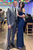 I have had my eye on this dress in this color for over a year, but had nowhere to wear it. When we got invited to a "black tie" wedding, I knew my moment had arrived! I have a small chest, small waist, and bigger booty. For me and my hourglass figure, it was perfect! Since I am 45, I did have someone close up the slit a lot because I didn't feel comfortable with how high it was. It did bunch a little on the side after that, but I didn't care!! For my smaller-chested sisters, this is great for us because it comes up high enough that we don't need to have cleavage to look good. - Isabella R.