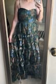 I really like this dress. The top doesn't fit me well without a bra, but that's easy to put on. The middle seam is itchy. Might wear something under. - Anna H.