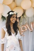 I wore this dress for my bridal shower and it was perfect! The way it fit made me feel confident and elegant. It even photographs beautifully. I couldn't have chosen a better dress to wear for my special day. - Catherine O.