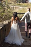 I bought this 9 days before eloping, praying this dress would fit, and it was a dream come true! I felt like a true princess in this on my special day. I couldn't believe the price was so affordable for something so beautifully designed. - Michelle F.