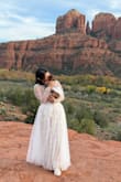 Wore this dress for our elopement in Sedona on 11/11 and it was stunning! The corset detailing is so beautiful! And I loved the white over the more ivory/beige inner lining. I did want a more conservative look and I love a turtleneck so I added the bolero. Only thing I didn't like that much was the breast cup - could've had more support but may work better for smaller breasts. Felt more expensive than what I paid for it! - Jeanette L.