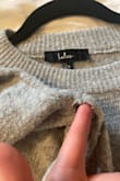 I bought this sweater and washed it 3 times on gentle cycle, inside out in cold water. It was never put in the dryer, I would hang it up to dry. After just 3 gentle washes there is a huge hole and tons of pilling. SHEIN quality but without the discounted price. Very disappointed. - Anastasia M.
