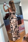 The fit of the dress is true to size. I did need to get the straps shortened. The dress was pretty long even with heels on, so I had to get it hemmed. The material is very nice & comfortable. I was pleased with this purchase. - Heather D.