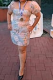 I fell in love the first time I saw this dress, I got for my daughter and she used it for her high school prom, she looked beautiful with this dress and received a lot of compliments, the material is a little bit kind of not so soft but my daughter loved it, it's a short dress. - Evelyn R.