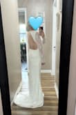 I thought the dress was gonna be crazy long, and it's not. With heels or some sort of elevated shoe, it'll be about perfect. I do have to have the back hemmed as it gapes open for me, but it'll be easy to do. I have a short torso, which is probably why. She's perfect, and I'm genuinely obsessed! - Cassie M.